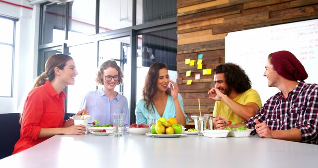 Creative Team Enjoying Lunch Together in Modern Office Space - Download Free Stock Images Pikwizard.com