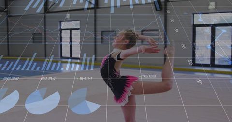 Young female gymnast balancing with digital charts overlay
