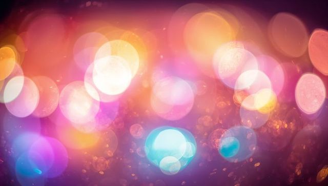 Dreamy Iridescent Bokeh Lights Gradient Background Featuring Luminous Colorful Orbs