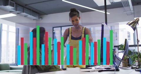Diverse Female Colleagues Analyzing Data with Digital Interface Overlay