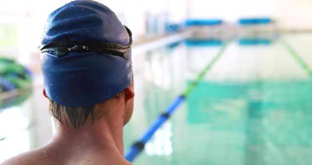 Swimmer Preparing for Training in Indoor Pool - Download Free Stock Images Pikwizard.com