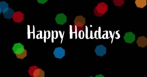 Happy Holidays Greeting with Colorful Bokeh on Black Background