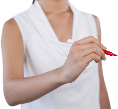 Businesswoman writing with red marker on transparent surface