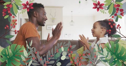 Father and Daughter Joyfully Playing at Home