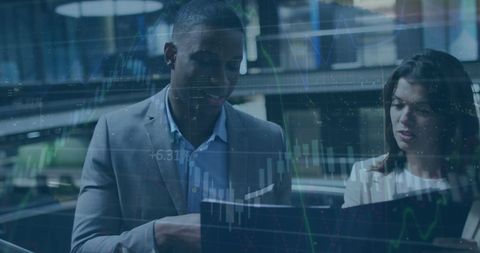 Diverse Business Professionals Collaborating on Financial Analysis