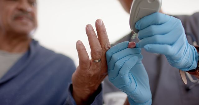 Healthcare Professional Checking Blood Sugar Level of Senior Patient - Download Free Stock Images Pikwizard.com