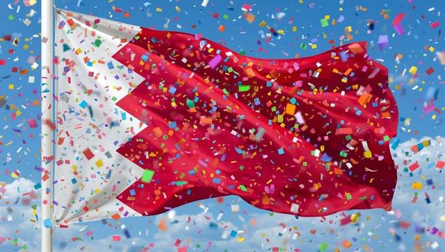 Bahrain flag waving amid festive confetti in blue sky