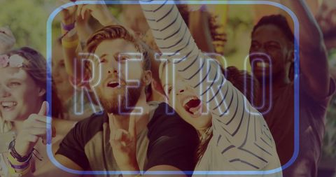 Neon retro text over friends enjoying music concert outdoors