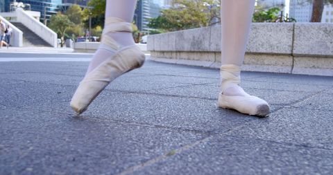 Ballet Dancer Performing Outdoor Pointe Work on Urban Sidewalk - Download Free Stock Images Pikwizard.com