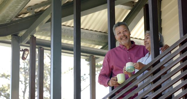 Happy Senior Couple Drinking Coffee on Balcony - Download Free Stock Images Pikwizard.com