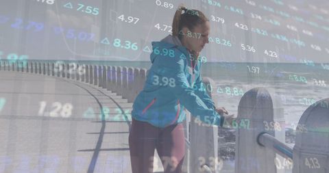 woman stretching with financial data overlay - Download Free Stock Images Pikwizard.com