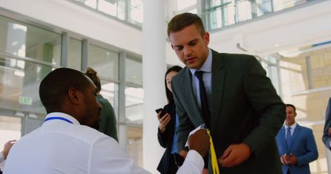 Diverse Professionals Registering for Business Conference