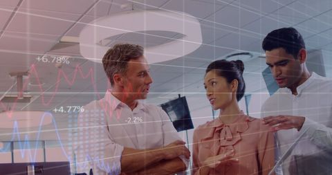 Diverse team analyzing digital growth data in modern office