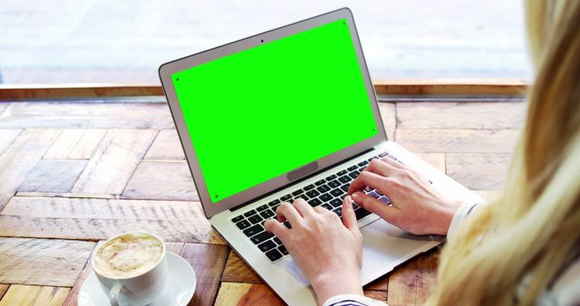 Woman Typing on Laptop with Green Screen at Cafe - Download Free Stock Images Pikwizard.com