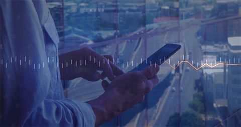 Businessman Analyzing Data on Smartphone in Urban Environment - Download Free Stock Images Pikwizard.com
