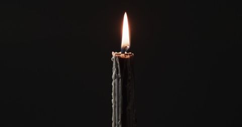 Single Candle Burning Brightly Against Dark Background - Download Free Stock Images Pikwizard.com