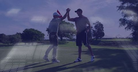 Two Golfers Celebrating Successful Putt with High Five