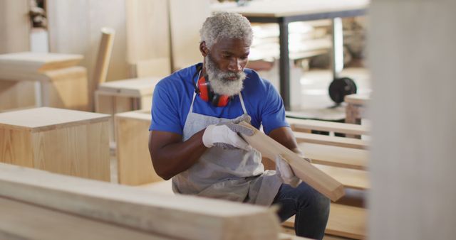 Senior Carpenter Working in Workshop Sanding Wood - Download Free Stock Images Pikwizard.com