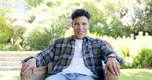 Young Man Relaxing Outdoors on Porch - Download Free Stock Images Pikwizard.com