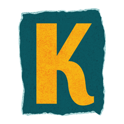Vintage distressed yellow k on teal panel with transparent background