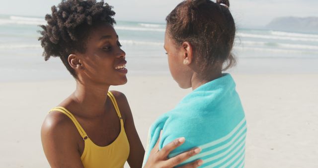 Mother and Daughter Enjoying Beach Day Together - Download Free Stock Images Pikwizard.com