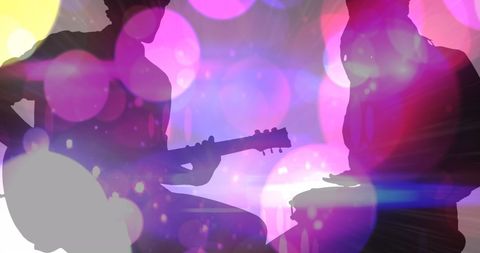Silhouette Duo Performing with Colorful Abstract Light Effects - Download Free Stock Images Pikwizard.com