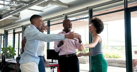 Diverse Team Celebrating Business Milestone Together