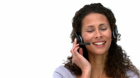 Happy Customer Service Agent Speaking on Headset