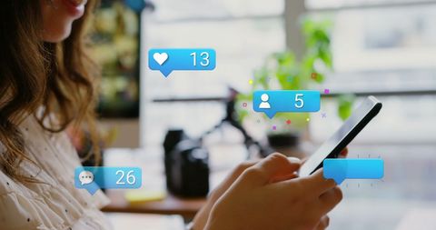 Woman Interacting with Social Media Icons on Smartphone - Download Free Stock Images Pikwizard.com