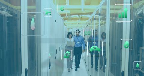 Diverse IT Team Working with Eco-Friendly Digital Interface in Server Room - Download Free Stock Images Pikwizard.com