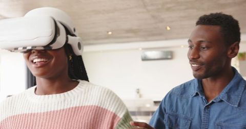 African American Couple Enjoying Virtual Reality Experience Together