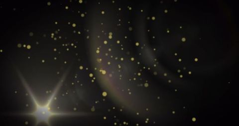 Glowing Yellow Particles on Black Cosmic Background