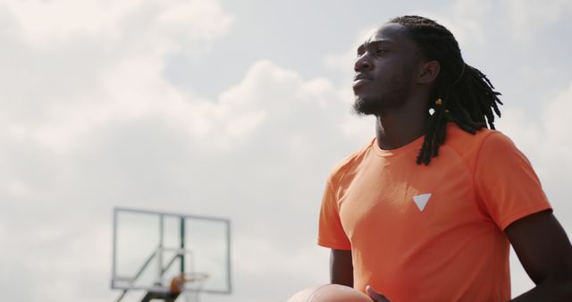 Athletic Young Man Holding Basketball Outdoors - Download Free Stock Images Pikwizard.com