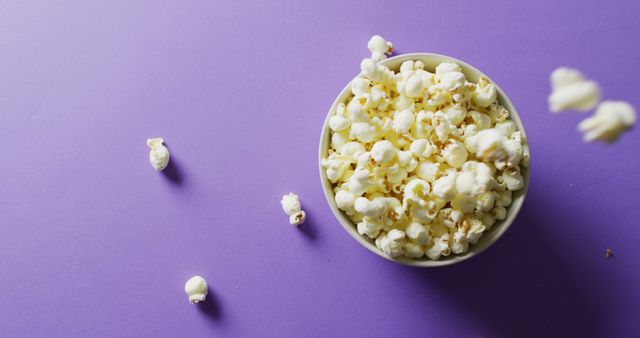 Close Up of Popcorn on Purple Background with Copy Space - Download Free Stock Images Pikwizard.com