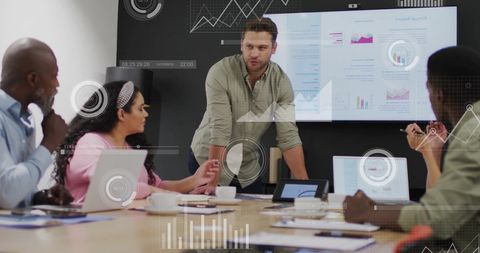 Team Collaborating on Digital Presentation with Data Visualizations - Download Free Stock Images Pikwizard.com