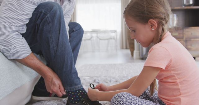 Father and Daughter Bonding Moment Tying Shoes - Download Free Stock Images Pikwizard.com