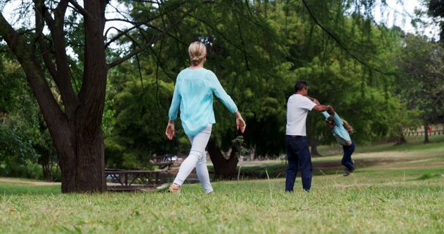 Family Enjoying Leisure Time at Park, Parents Playing with Child - Download Free Stock Images Pikwizard.com