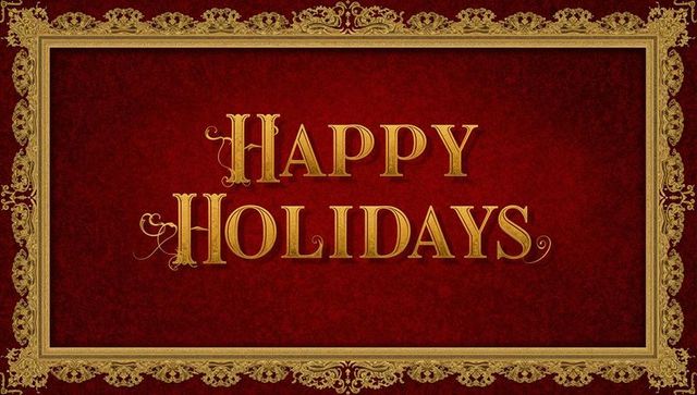 Gold embossed happy holidays greeting on red velvet with ornate baroque filigree frame