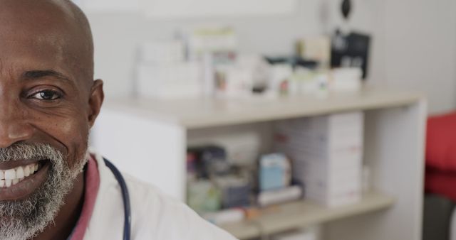 Close-Up of Smiling Doctor in Hospital Office with Medicine Background - Download Free Stock Images Pikwizard.com