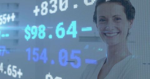 Smiling professional engages technology in futuristic trading environment