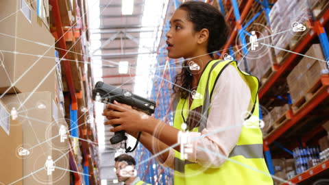 Warehouse Worker Using Scanner with Digital Data Overlay