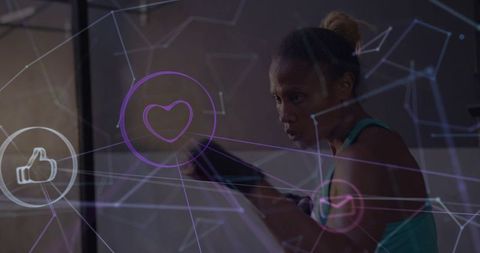 Woman training with boxing mitts while digital fitness network overlay showing social engagement