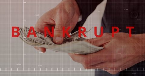Economic crisis concept with bankrupt text and man counting money