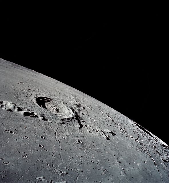 AS17-145-22285 (7-19 Dec. 1972) --- This is a view of the Eratosthenes Crater, taken looking southward from the Command and Service Module (CSM), being piloted by astronaut Ronald E. Evans. Copernicus is on the horizon. The other astronauts are Eugene A. Cernan, commander; and Harrison H. Schmitt, lunar module pilot.