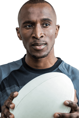 Determined rugby player holding ball on transparent background