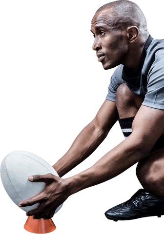Rugby player preparing kick with transparent background