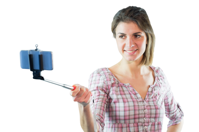 Smiling Woman Taking Selfie with Smartphone on Selfie Stick Transparent Background - Download Free Stock Videos Pikwizard.com