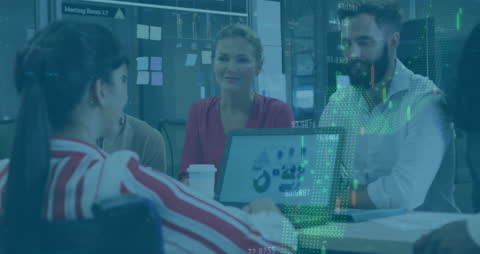 Diverse Business Team Analyzing Financial Data in Dynamic Office