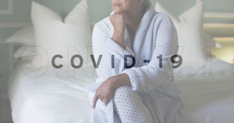 Sad Senior Woman on Bed During Pandemic