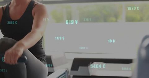 Woman Using Rowing Machine with Currency Data Overlay in Modern Gym